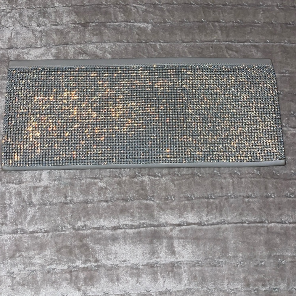 Preloved Vintage Daniel Swarovski lambskin clutch opal color almost grey .